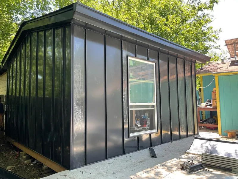 Black standing seam metal wall panels for Metal Roof Installation in College Place